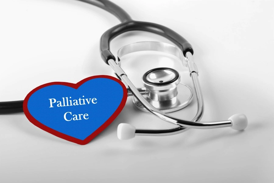 Stethoscope beside a heart-shaped tag reading Palliative Care